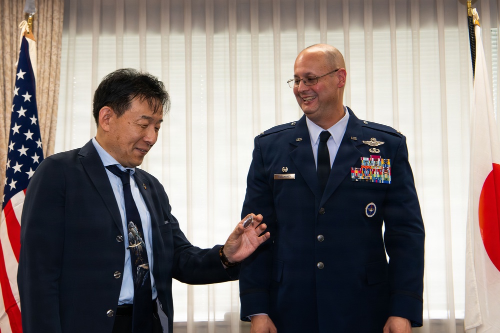 374th AW commander visits local leaders