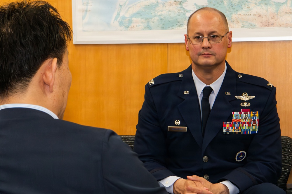 374th AW commander visits local leaders
