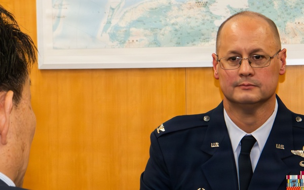 374th AW commander visits local leaders
