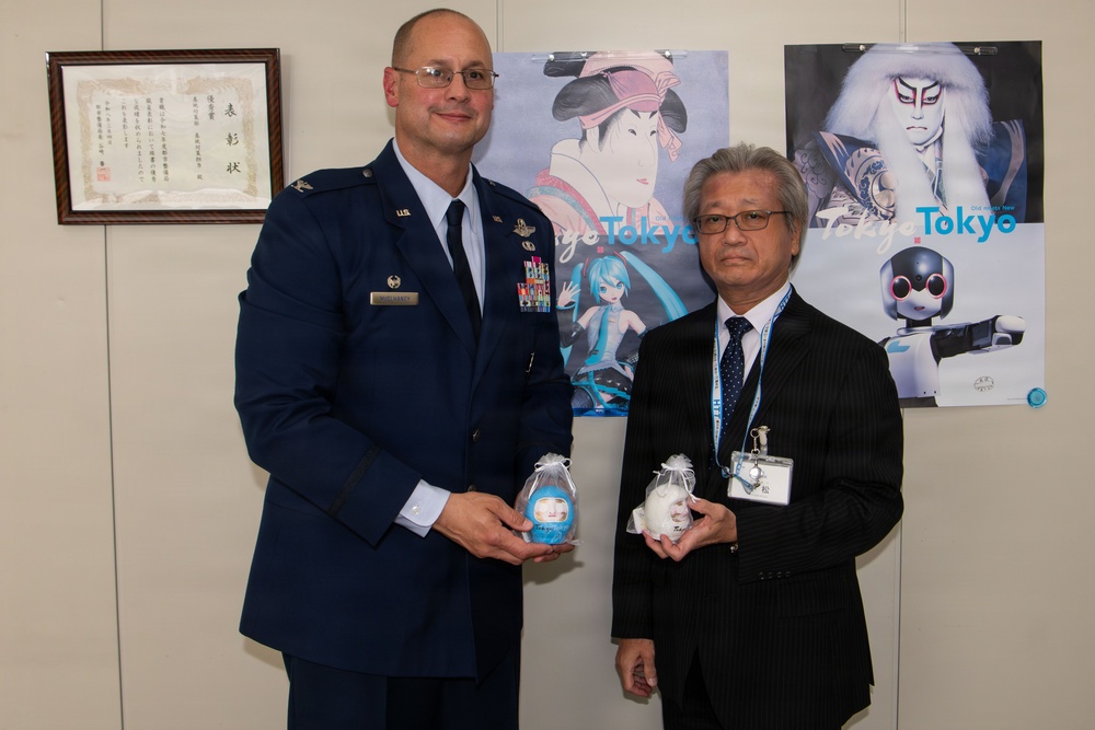 374th AW commander visits local leaders