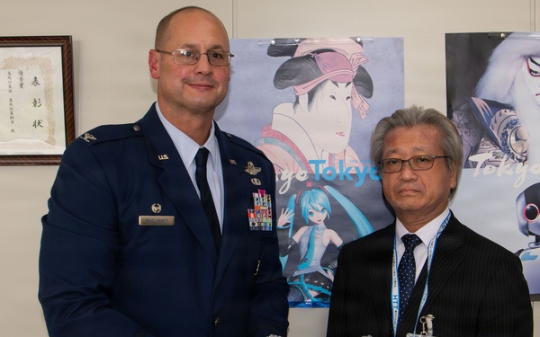 374th AW commander visits local leaders