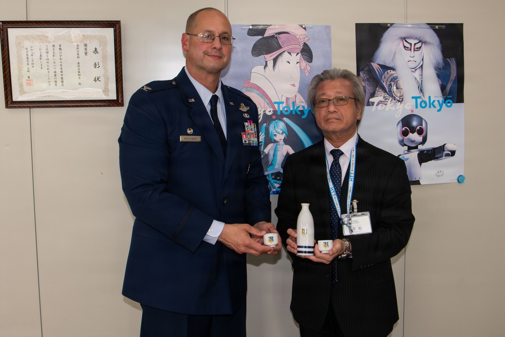 374th AW commander visits local leaders