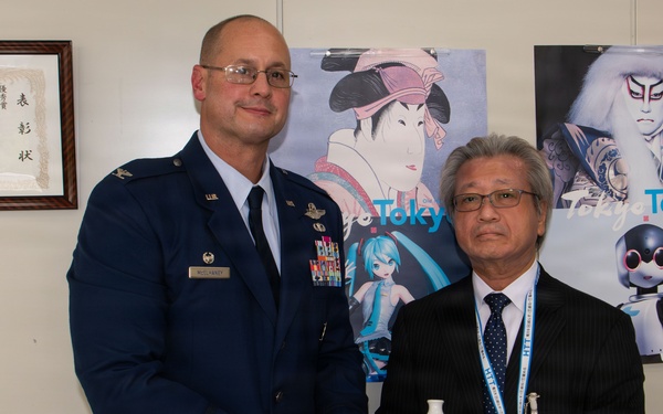 374th AW commander visits local leaders