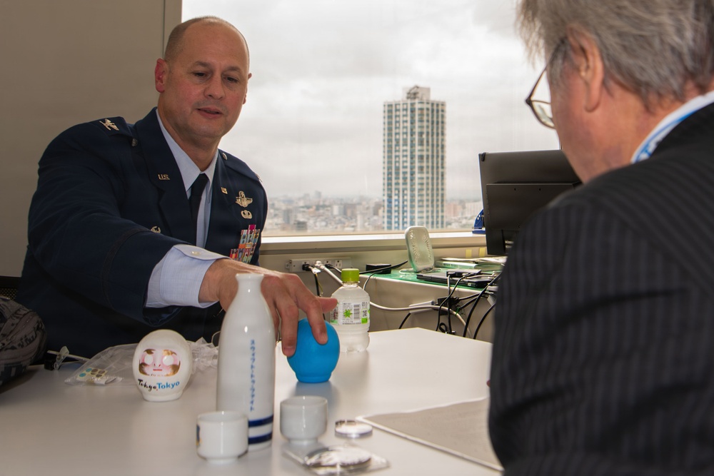 374th AW commander visits local leaders