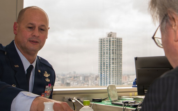 374th AW commander visits local leaders