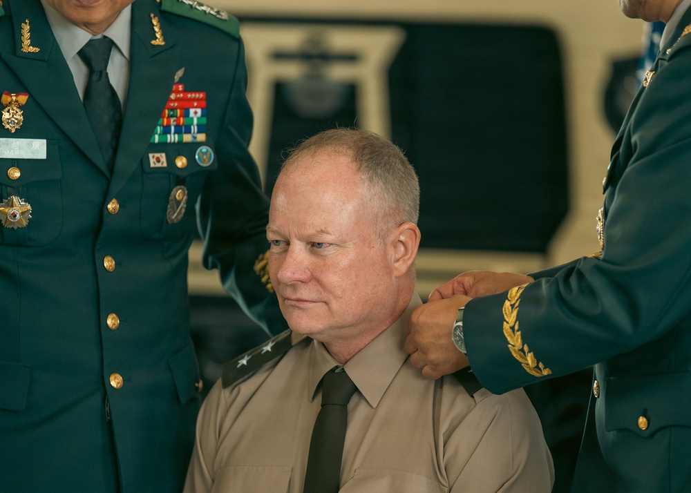 SOCKOR commanding general pins on second star