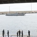 A landing craft, utility approaches the well deck of the San Antonio-class amphibious transport dock USS Fort Lauderdale (LPD 28), at the port of La Guaira, Venezuela, July 6, 2026.