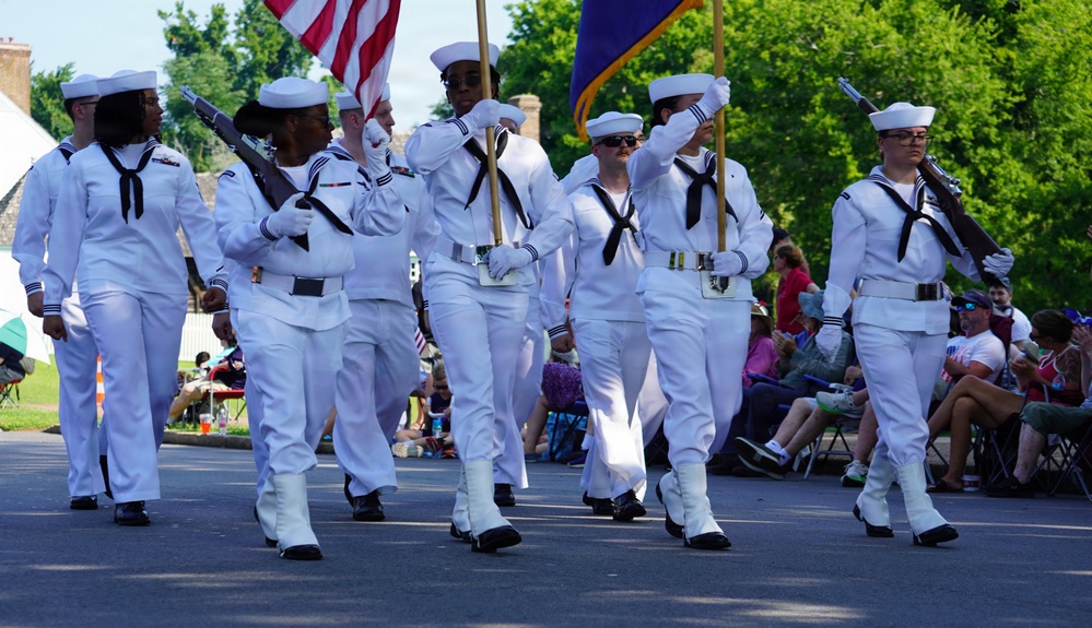 Sailors from Naval Weapons Station Yorktown march in the annual 4th of July Parade in Yorktown