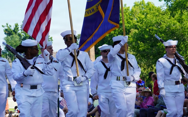 Sailors from Naval Weapons Station Yorktown march in annual 4th of July Parade