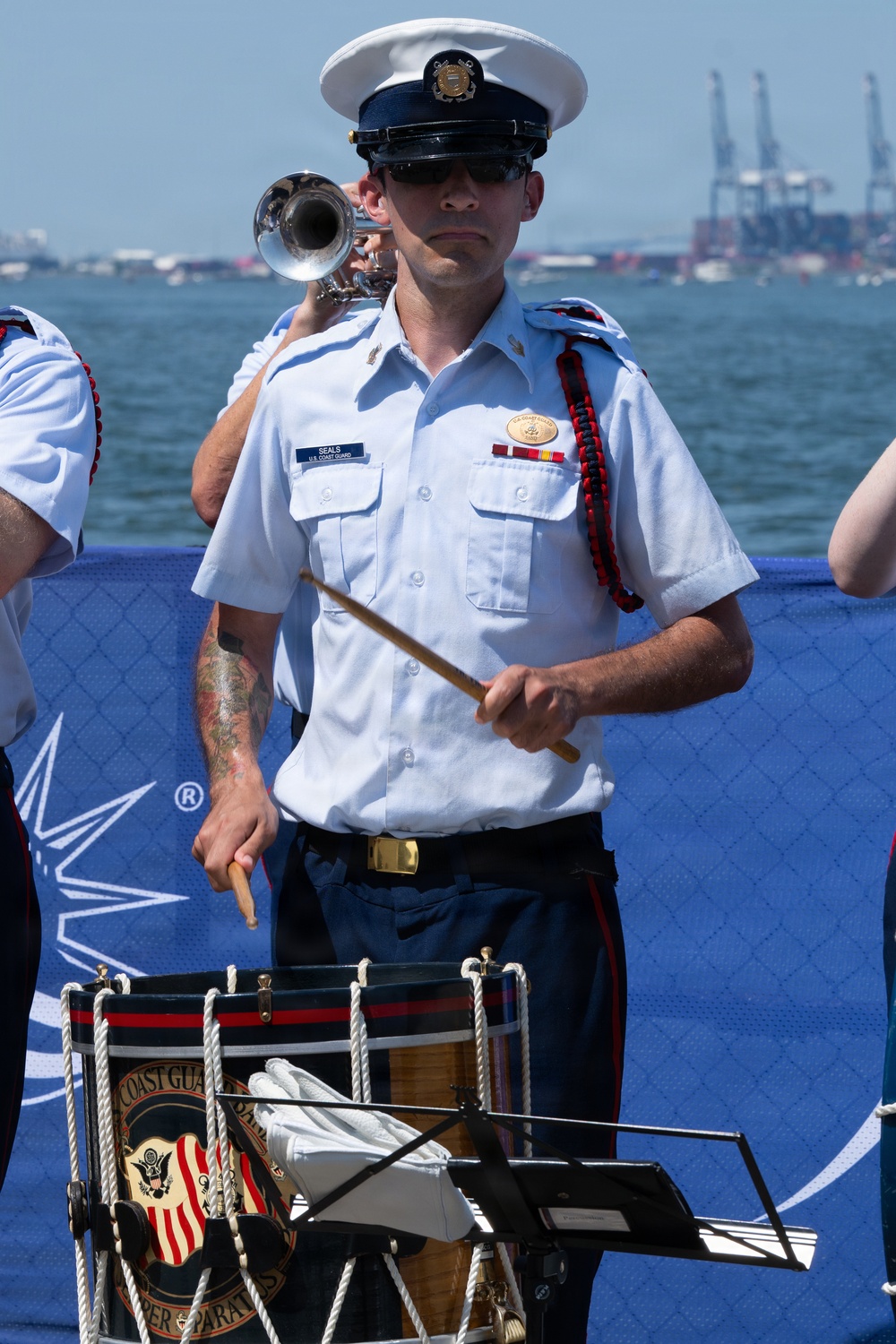 U.S. Coast Guard Band plays on Governor’s Island during Parade of Sail in New York
