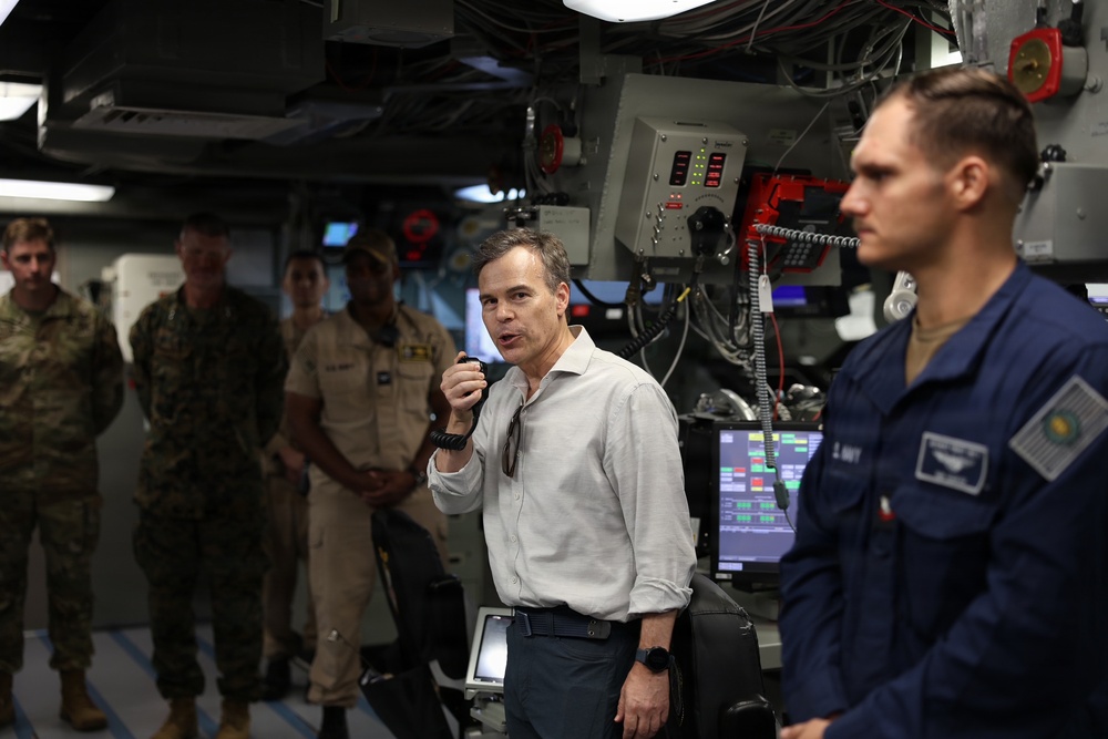 U.S. Chargé d’Affaires John Barrett addresses the crew of the San Antonio-class amphibious transport dock ship USS Fort Lauderdale.