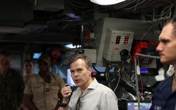 U.S. Chargé d’Affaires John Barrett addresses the crew of the San Antonio-class amphibious transport dock ship USS Fort Lauderdale.