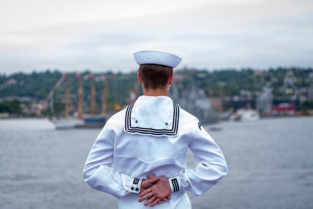 Nimitz Sailors Man The Rails As The Ship Pulls Out Of New York Harbor
