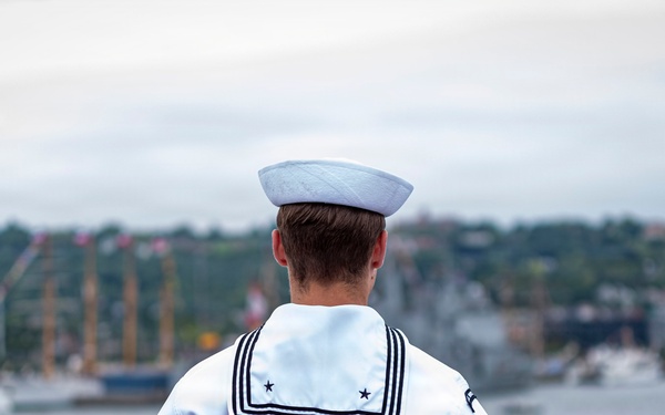 Nimitz Sailors Man The Rails As The Ship Pulls Out Of New York Harbor