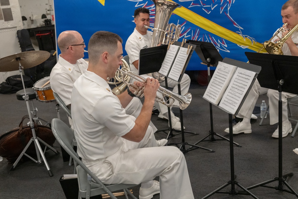 U.S. Navy Band Brass Quintet perform at the International Naval Review Closing Ceremony