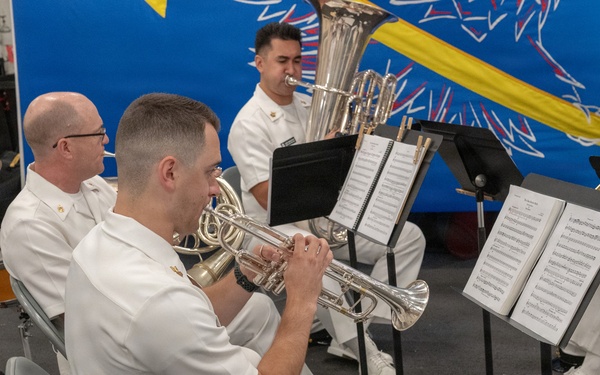 U.S. Navy Band Brass Quintet perform at the International Naval Review Closing Ceremony