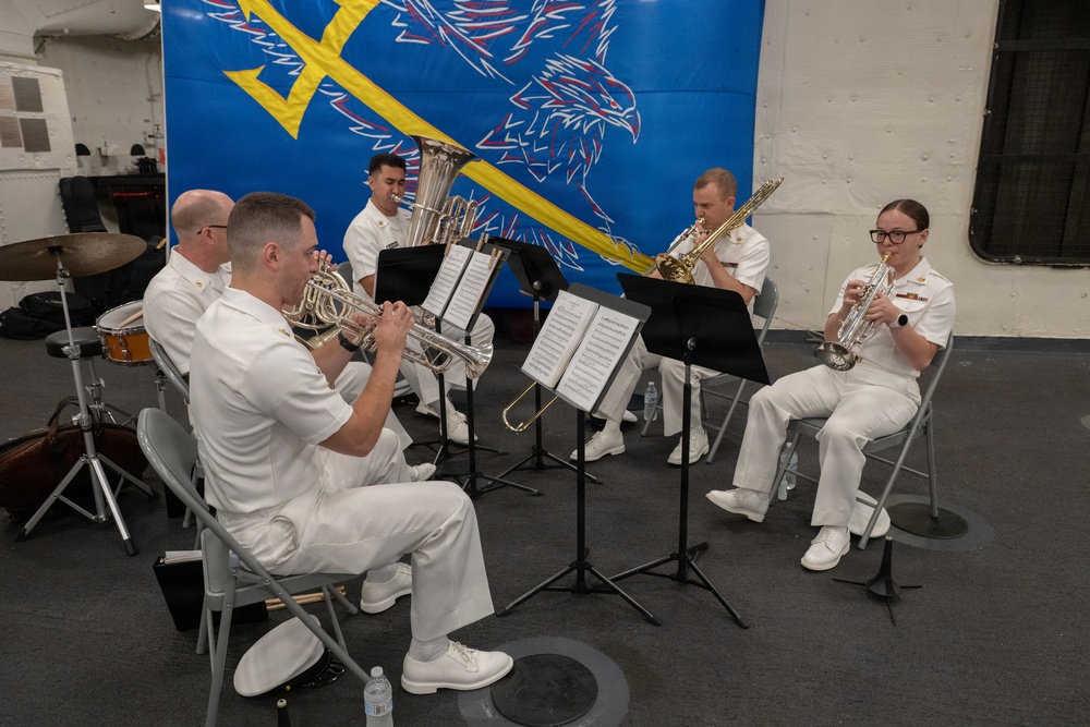 U.S. Navy Band Brass Quintet perform at the International Naval Review Closing Ceremony
