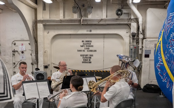 U.S. Navy Band Brass Quintet perform at the International Naval Review Closing Ceremony
