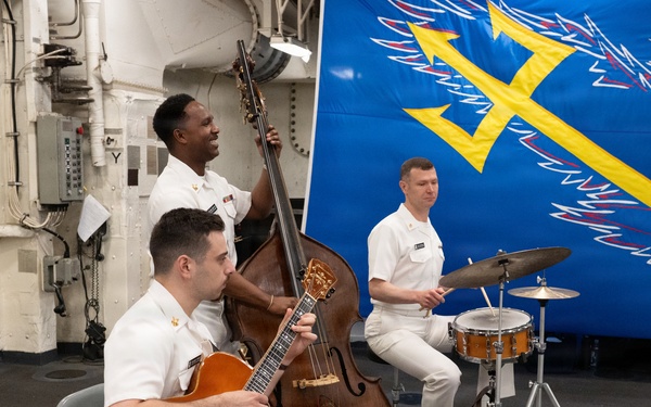 U.S. Navy Band Commodores Jazz Combo perform at the International Naval Review Closing Ceremony