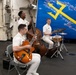 U.S. Navy Band Commodores Jazz Combo perform at the International Naval Review Closing Ceremony