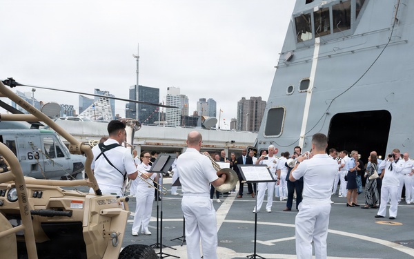 U.S. Navy Band Brass Quintet perform at the International Naval Review Closing Ceremony