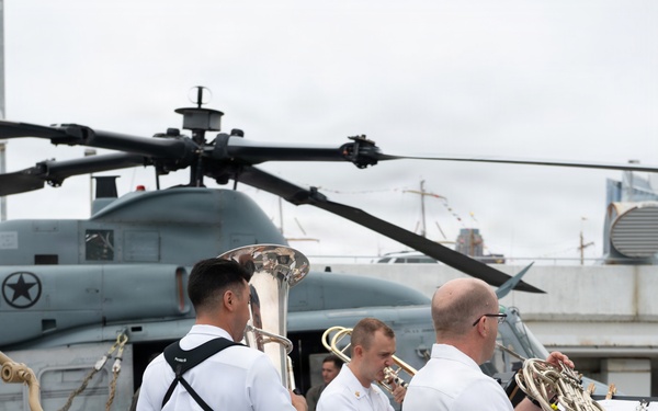 U.S. Navy Band Brass Quintet perform at the International Naval Review Closing Ceremony