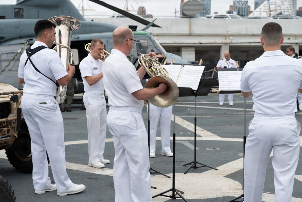 U.S. Navy Band Brass Quintet perform at the International Naval Review Closing Ceremony