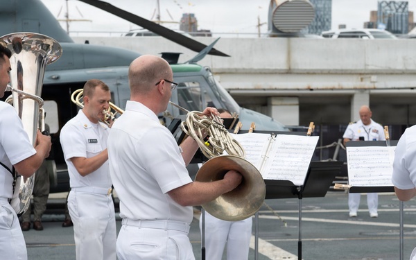 U.S. Navy Band Brass Quintet perform at the International Naval Review Closing Ceremony
