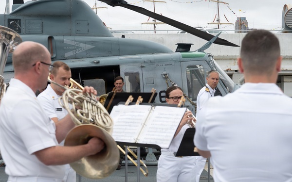 U.S. Navy Band Brass Quintet perform at the International Naval Review Closing Ceremony