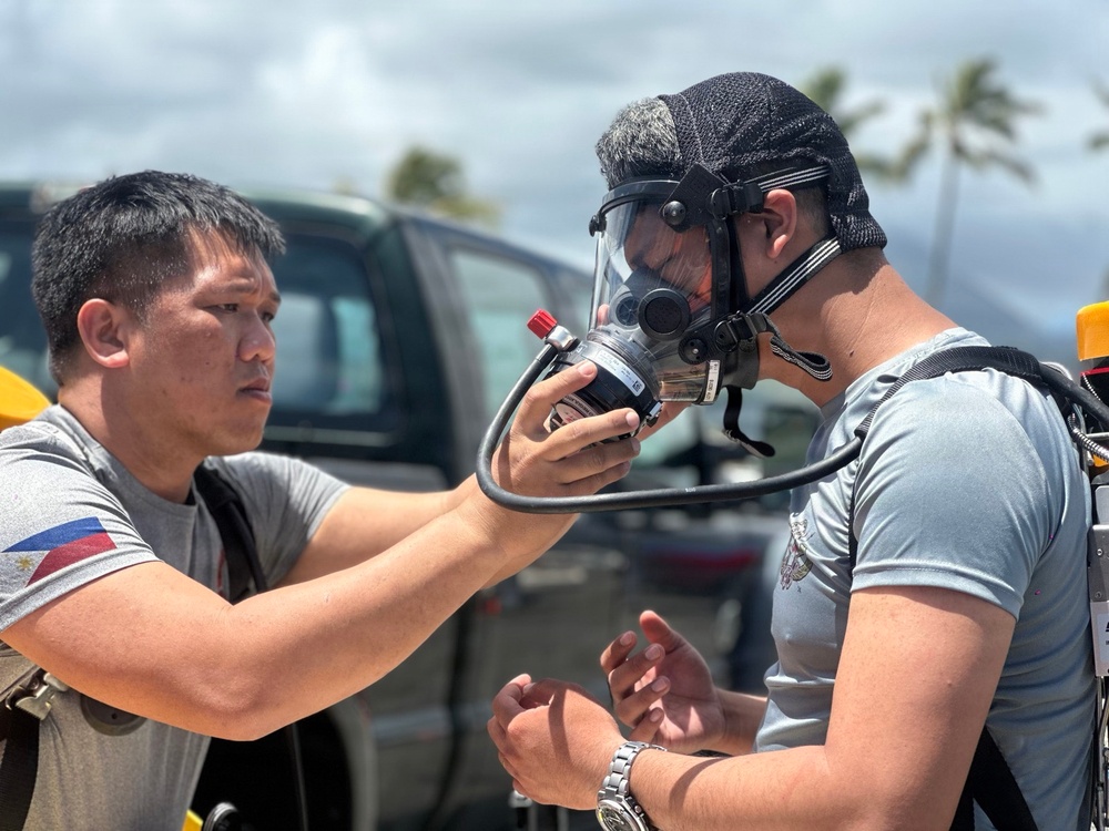 Multinational forces participate in a CBRN response exercise during RIMPAC 2026 HADR training