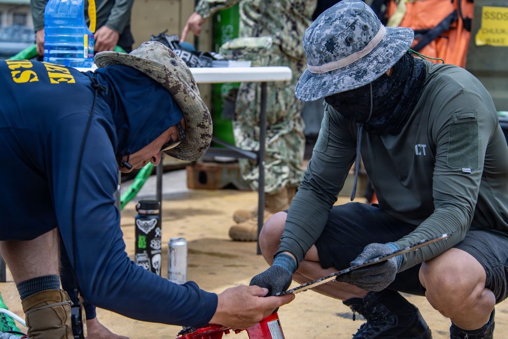 Navy Seabees and Republic of Korea divers conduct joint pier repairs during RIMPAC 2026