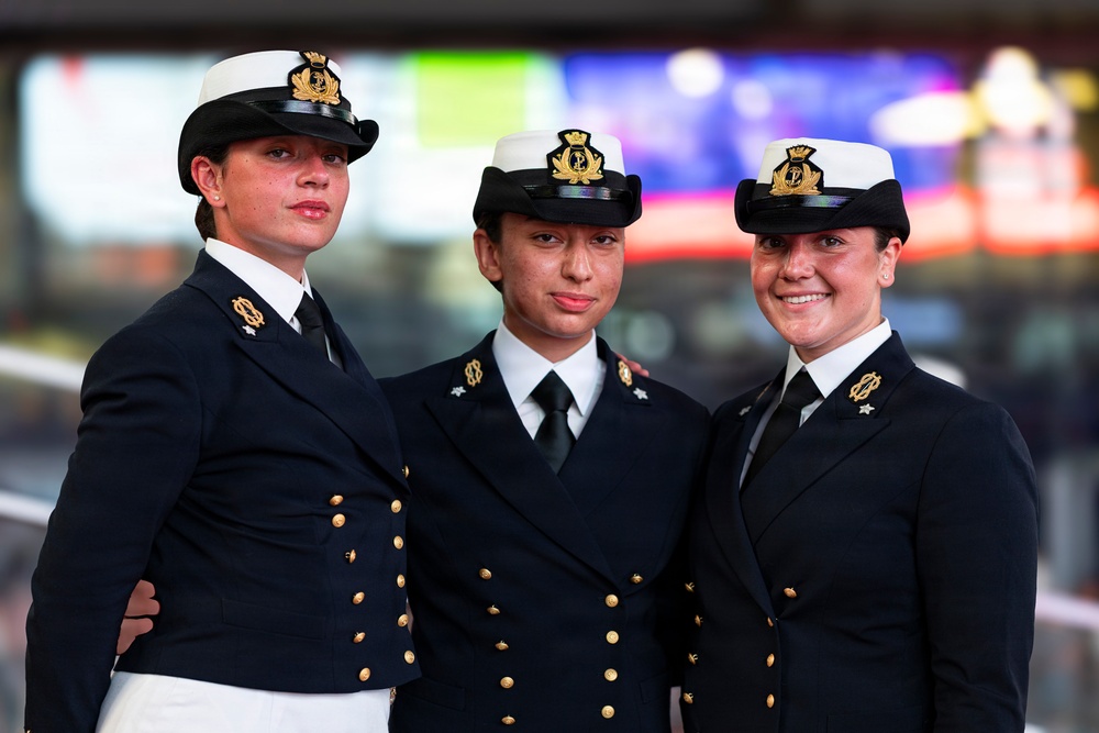 British Royal Navy Sailors pose for a photo in Times Square in New York-INR250