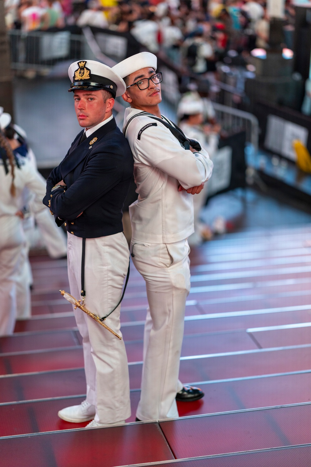 U.S. Sailor and Royal British Navy Sailor pose in Times Square in New York