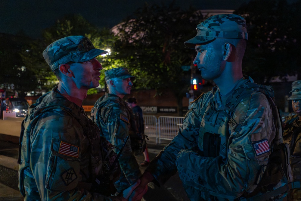 Mississippi Army National Guard commander shakes hands with Soldiers after supporting America 250