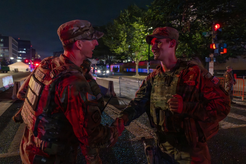 Mississippi Army National Guard commander shakes hands with Soldiers after supporting America 250