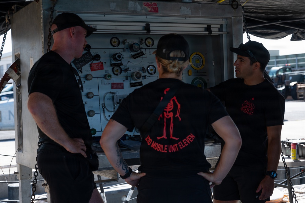 Multinational Clearance Divers conduct a wreck access cutting dive during RIMPAC 2026