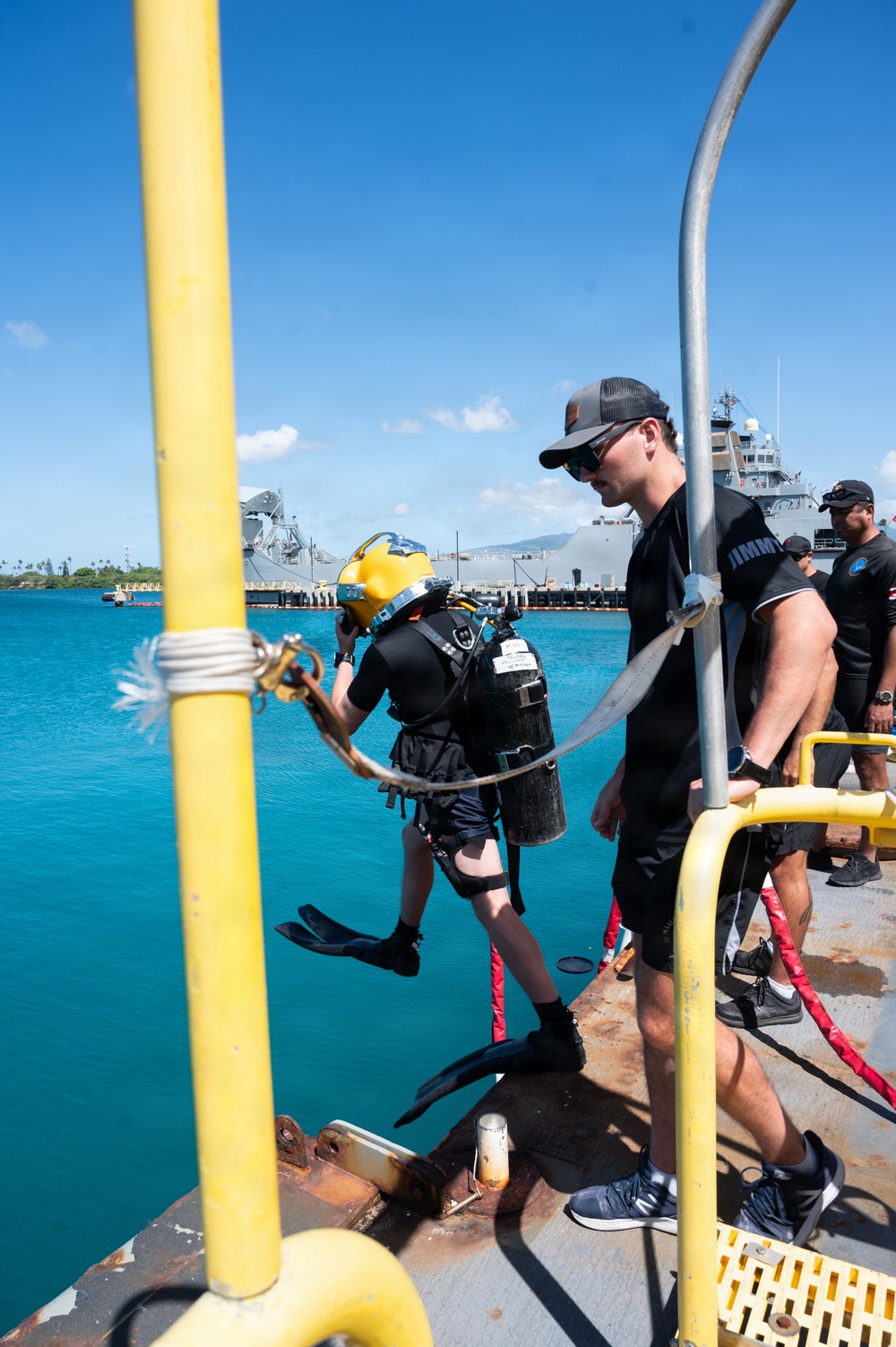 Multinational Clearance Divers conduct a wreck access cutting dive during RIMPAC 2026