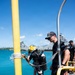 Multinational Clearance Divers conduct a wreck access cutting dive during RIMPAC 2026