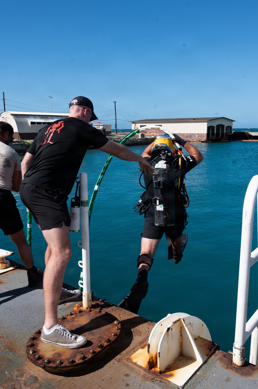 Multinational Clearance Divers conduct a wreck access cutting dive during RIMPAC 2026