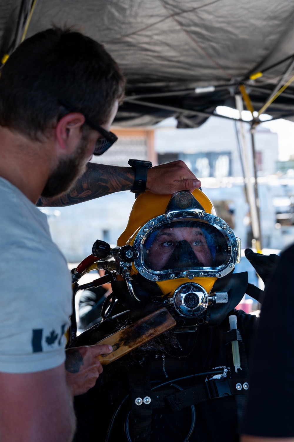 Multinational Clearance Divers prepare for a wreck access cutting dive during RIMPAC 2026