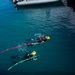 Multinational Clearance Divers conduct a wreck access cutting dive during RIMPAC 2026