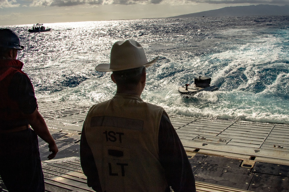 Digitally crewed surface vessel delivers supplies USS Essex during RIMPAC 2026