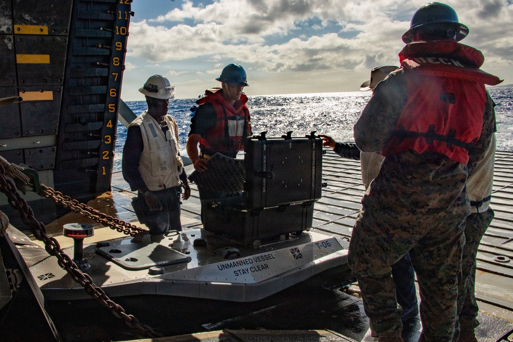 Digitally crewed surface vessel delivers supplies USS Essex during RIMPAC 2026