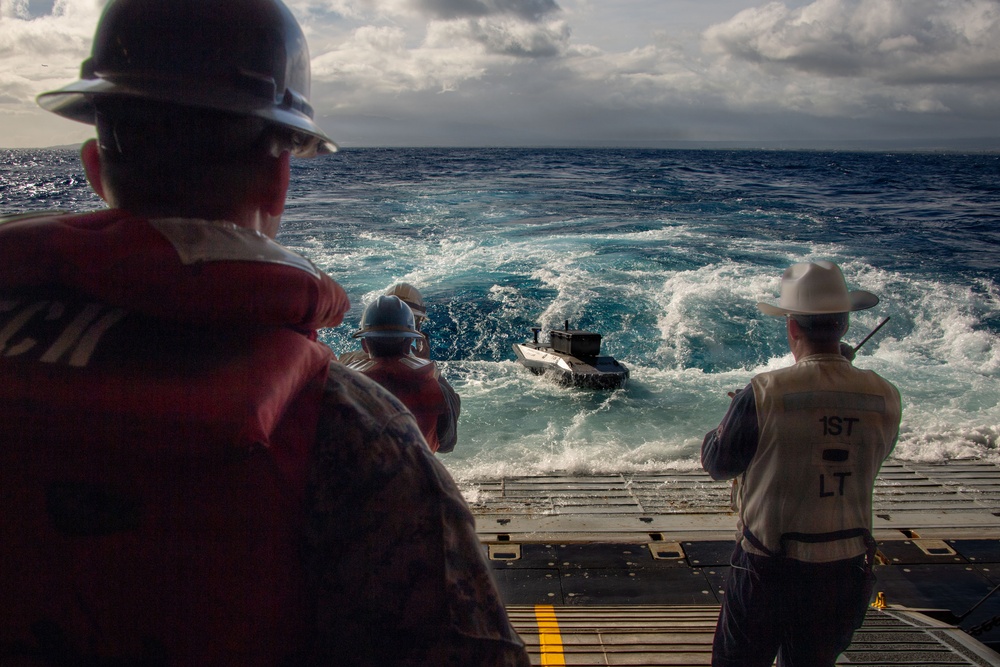 Digitally crewed surface vessel delivers supplies USS Essex during RIMPAC 2026