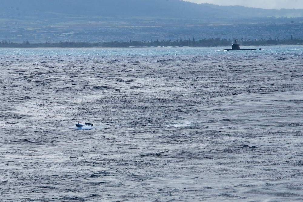 Digitally crewed surface vessel delivers supplies USS Essex during RIMPAC 2026