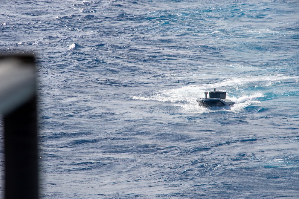 Digitally crewed surface vessel delivers supplies USS Essex during RIMPAC 2026