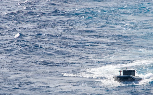 Digitally crewed surface vessel delivers supplies USS Essex during RIMPAC 2026