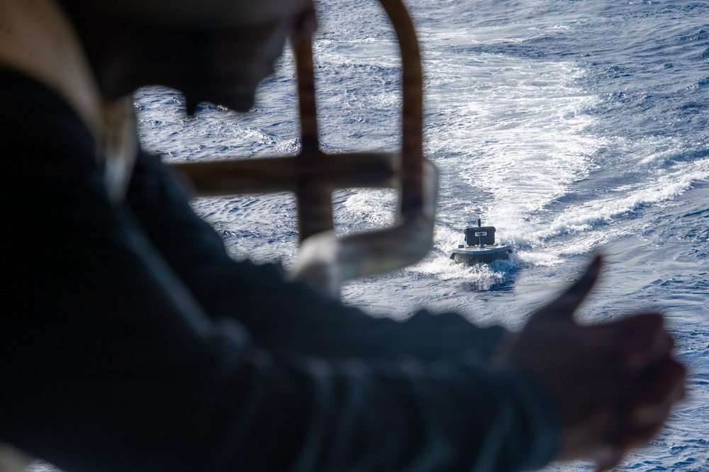 Digitally crewed surface vessel delivers supplies USS Essex during RIMPAC 2026