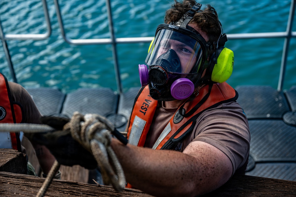 UCT 2 and NMCB 3 WCC conduct pier repairs at Joint Base Pearl Harbor-Hickam