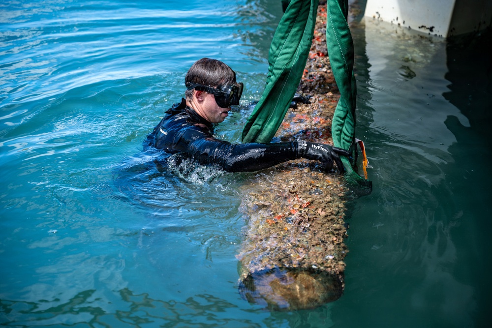 UCT 2 and NMCB 3 WCC conduct pier repairs at Joint Base Pearl Harbor-Hickam